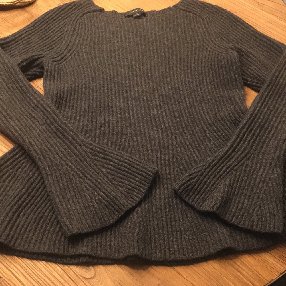 Ann Taylor- Charcoal grey peplum sweater. Perfect for back to office wardrobe!